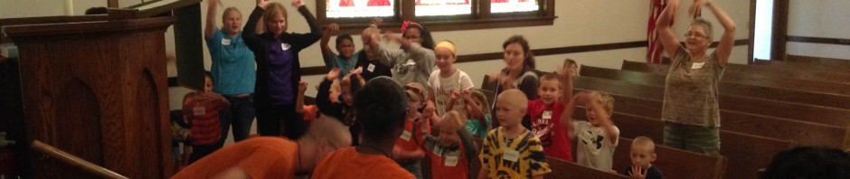 Children enjoying an interactive activity in a church setting.