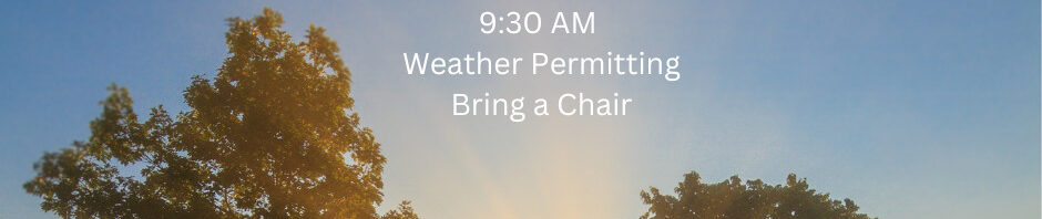 Outdoor worship event with sunrise and trees.